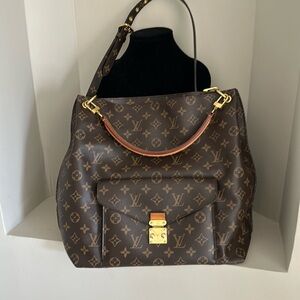 Louis Vuitton Métis Monogram handbag canvas. AR2104
